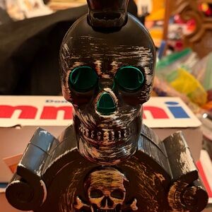 Black Skull Decor with Green Accents